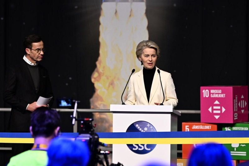 Sweden's Prime Minister Ulf Kristersson (L) looks on Friday as European Commission President Ursula von der Leyen delivers a speech at the inauguration of the Spaceport Esrange's new satellite launch ramp outside Kiruna, Sweden.  Photo by Jonas Ekstroemer/EPA-EFE