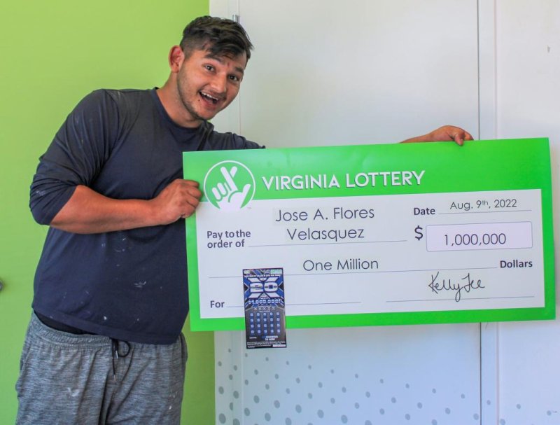 Jose Flores Velasquez of Annandale, Va., took his scratch-off ticket to a Virginia Lottery office expecting to claim a $600 prize, but he soon discovered his ticket was actually worth $1 million. Photo courtesy of the Virginia Lottery