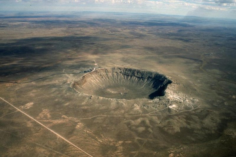 This crater in Arizona was produced by the impact of a 165-foot-wide meteor, the type of impact that new research suggests regularly happened between 2.5 and 3.5 billion years ago. Photo by Dale Nations/AZGS