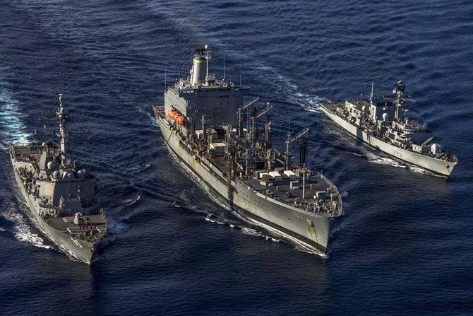 U.S., British naval ships conduct exercises in South China Sea