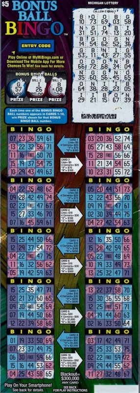 An Oakland County, Mich., woman told Michigan Lottery officials she had never tried a Bonus Ball Bingo scratch-off ticket until her father picked one out for her and she won a $300,000 prize. Photo courtesy of the Michigan Lottery