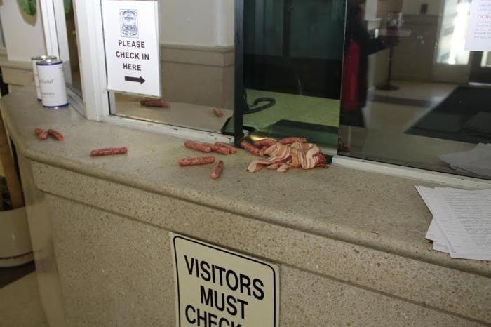 The crime scene after a woman attempted to deliver uncooked breakfast meats to a police station just outside of Boston. Photo by Framingham Police.