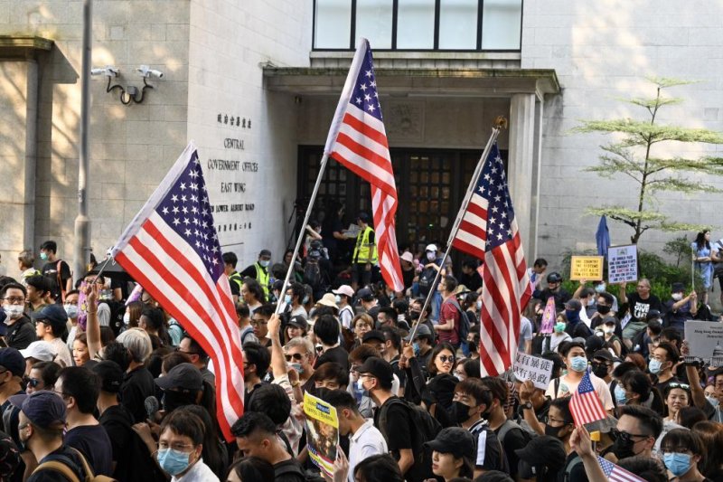 Hong Kong protesters march to U.S. Consulate in plea for help
