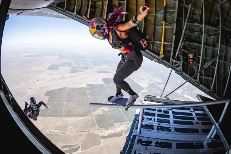 Leticia Bufoni performed a feeble grind out the back of a plane at 9,022 feet to set a new Guinness World Record. Photo courtesy of Guinness World Records