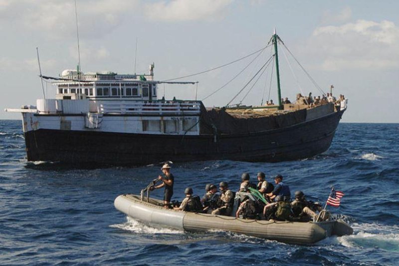 The Indian commercial ship Al Kaushar, seen here in 2006 with a U.S. Navy crew from the USS Carter Hall in the foreground, was hijacked Saturday by Somali pirates. The Al Kaushar had 11 crew members aboard when it was hijacked as it traveled from Dubai to Yemen. Photo by Petty Officer 2/c Michael Sandberg/U.S./Navy