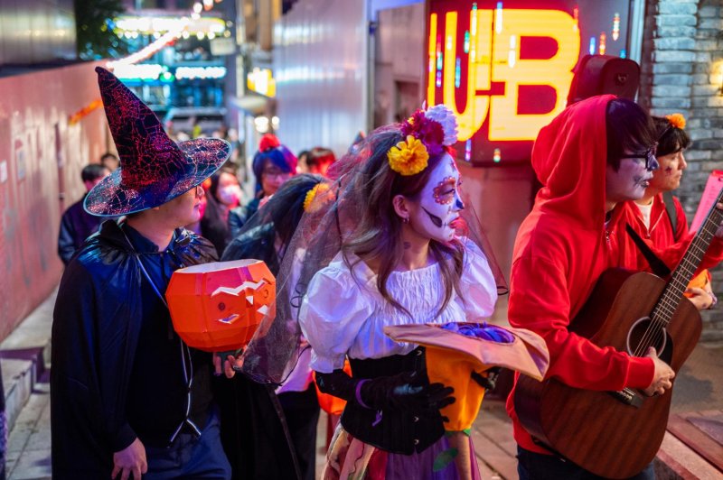 Visitors returned to the Seoul neighborhood of Itaewon on Saturday, one year after the Halloween crowd crush that claimed 159 lives. Photo by Thomas Maresca/UPI