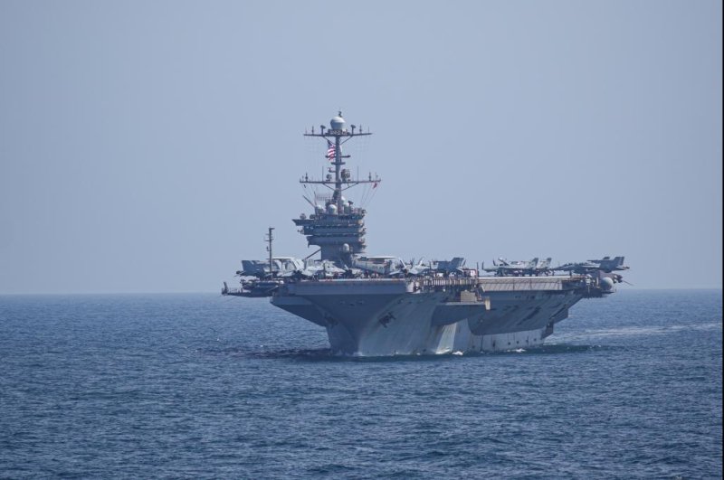 The aircraft carrier USS Harry S. Truman follows the aircraft carrier USS Dwight D. Eisenhower while transiting the Arabian Sea on March 21. Photo by Brandon C. Cole/U.S. Navy&nbsp;