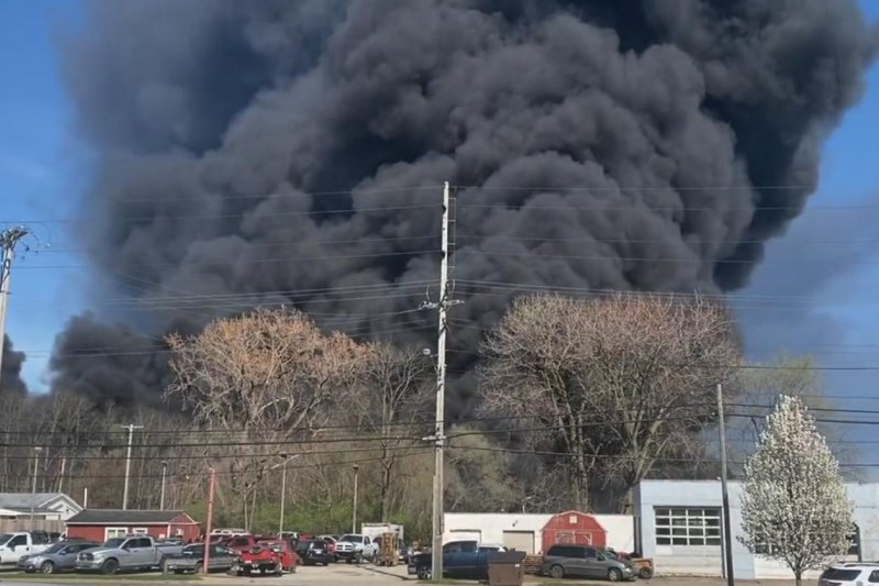 A large plume of black smoke billows Tuesday from a fire at a plastics recycling plant in Indiana. Residents in the city of Richmond were instructed to evacuate or shelter in place because of air quality concerns. Photo courtesy of Indiana State Police Pendleton District