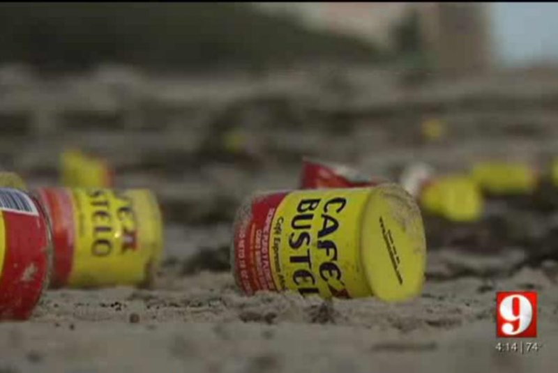 Thousands of cans of coffee, along with other items, washed up on Florida beaches Tuesday and Wednesday. WFTV video screenshot