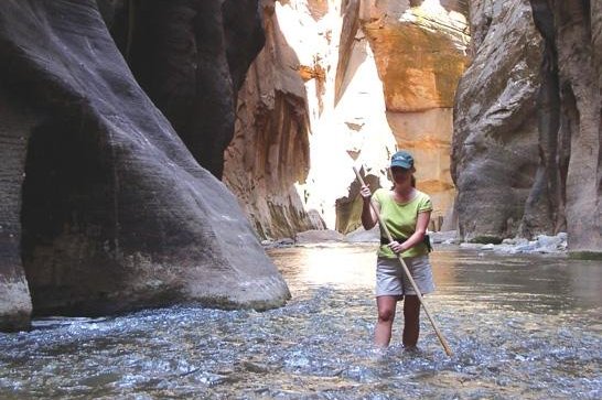 Undated photo of a hiker traveling in the world-famous Zion Nation Park Narrows in Utah. One man was rescued but a woman died after an overnight hike on Wednesday. File Photo by National Park Service/UPI