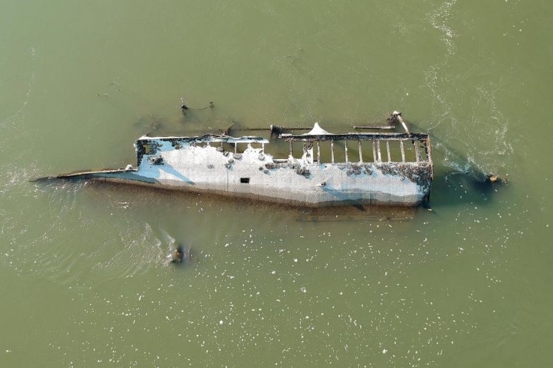 The German ships, which were part of the Nazis' Black Sea fleet, were intentionally sunk in the Danube River in 1944 to prevent advancing Russian troops from seizing them. Photo by Csaba Krizsan/EPA-EFE