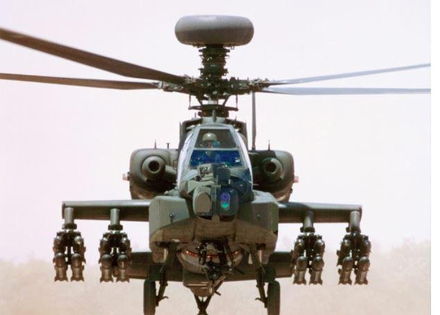 Lockheed Martin announced a $164.6 million contract on Friday to build Longbow Fire Control Radar units, pictured mounted above the routers of an AH-64E Apache, for the armies of four nations. Photo courtesy of Lockheed Martin