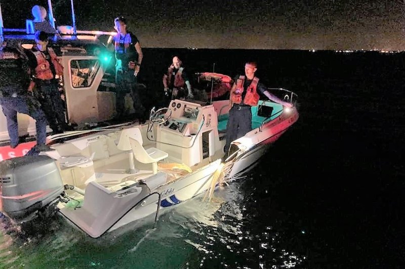 Coast Guard search and rescue crews plucked 10 survivors of a boat collision from the Atlantic Ocean off Key Biscayne, Florida, late on Friday. U.S. Coast Guard Photo by Station Miami Beach