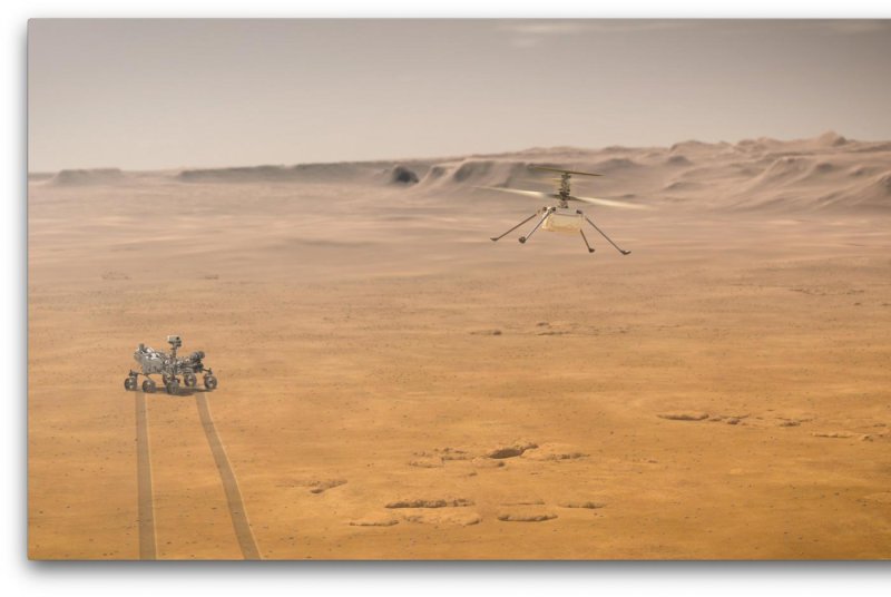 Artist's concept of NASA's Ingenuity Mars Helicopter on the Red Planet, with the agency's Mars 2020 Perseverance rover close by. Ingenuity completed its 35th flight on Mars over the weekend. Image courtesy NASA//JPL-Caltech
