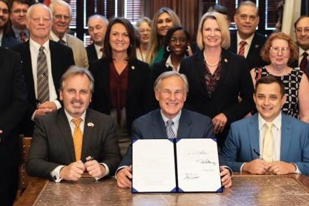 Texas Gov. Greg Abbott signs into law a controversial bill that opponents say will give the government the power to regulate speech online. Photo courtesy Office of Texas Gov. Greg Abbott