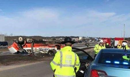 An oil tanker truck rollover in Maine Monday spilled heating oil across the I-295 and into the Fore River. Photo courtesy of the Maine State Police