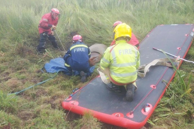 The Cheshire Fire and Rescue Service in Britain came to the rescue of a horse named Charlie who became stuck on his side in a muddy pond. Photo courtesy of the Cheshire Fire and Rescue Service