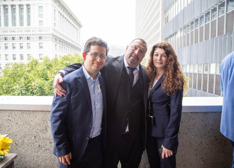 The Los Angeles District Attorney's Office on Thursday announced that Daniel Saldana (center) was exonerated after spending 33 years in prison on a wrongful conviction related to a 1989 shooting. Photo by Los Angeles District Attorney's Office/Twitter