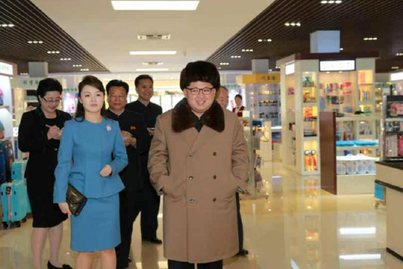 North Korean leader Kim Jong Un and his wife, Ri Sol Ju, visiting an upscale department store in Pyongyang in March. Another store in the city receives tens of thousands of visitors despite sanctions, a newspaper based in Japan reported Wednesday. File Photo by Rodong Sinmun