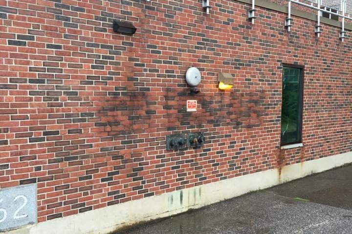 A vandal spray-painted "I'm drunk" on the side of a New Hampshire police station. Photo by Portsmouth Police/Facebook