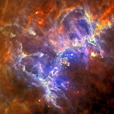 Combining almost opposite ends of the electromagnetic spectrum, this composite of the Herschel in far-infrared and XMM-Newton’s X-ray images shows how the hot young stars form. Credit: ESA