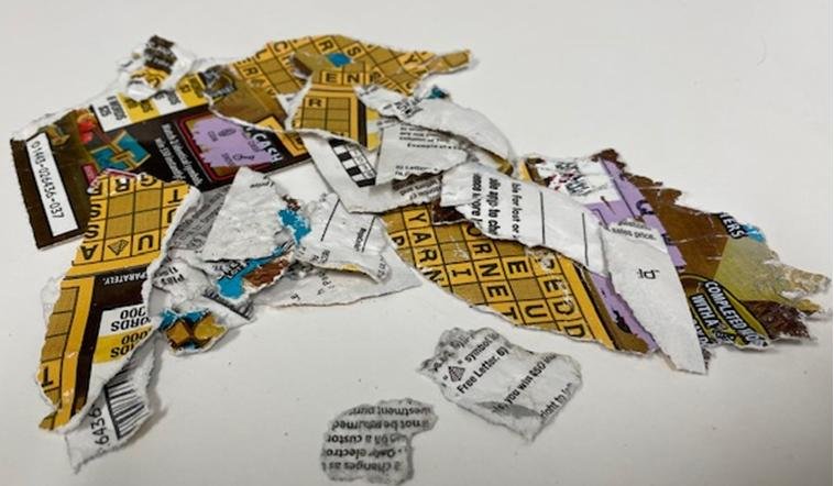 Nathan and Rachael Lamet of Salem, Ore., mailed this shredded scratch-off ticket to the Oregon Lottery after it was ripped up by their dogs, Apple and Jack. The ticket turned out to be an $8 winner. Photo courtesy of the Oregon Lottery