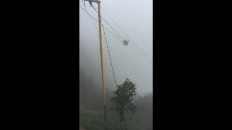 A tourist takes a swing on the "Swing at the End of the World" in Ecuador. Newsflare video screenshot
