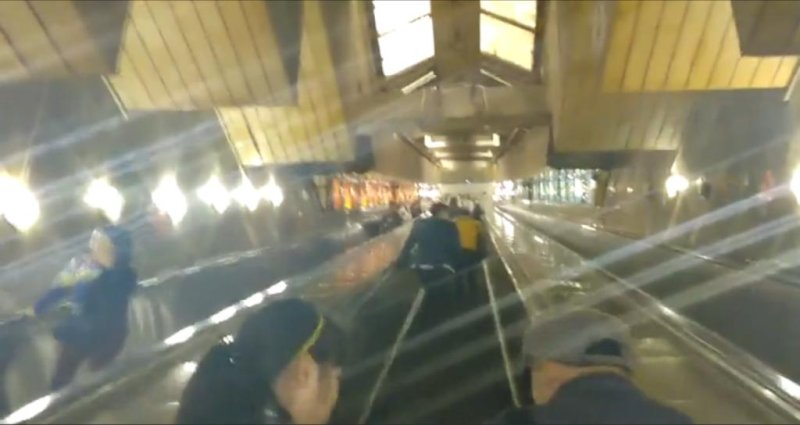The escalator ride at China's Chongqing Railway Station takes a full 2-1/2 minutes to reach the top. Newsflare video screenshot