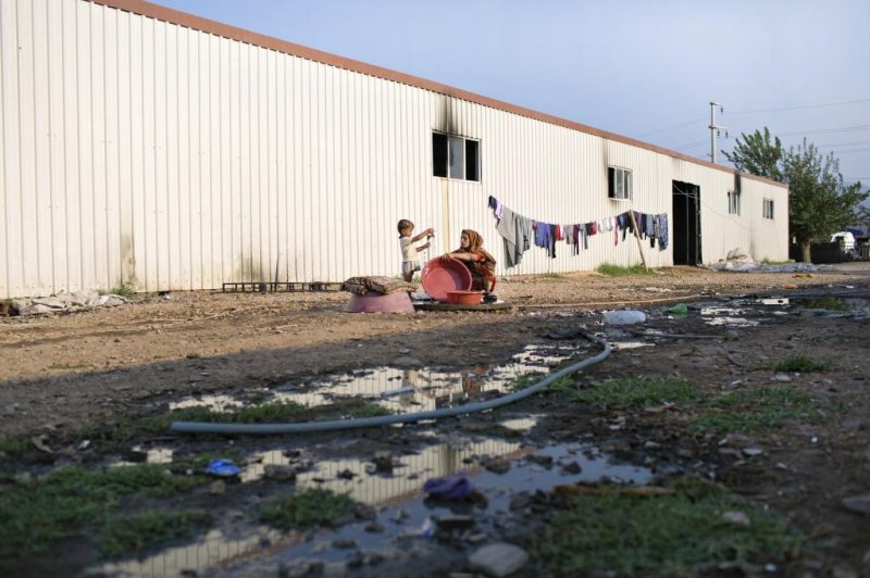 Inside the Turkish camps where Syrian refugees work for $8 a day