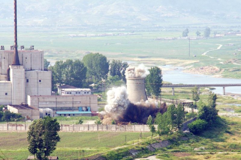 North Korea has invited journalists to attend the dismantlement of the Punggye-ri nuclear site on May 23-25. Pictured, above, is the demolition of a cooling tower at Yongbyon in June 2008. File Photo by Yonhap