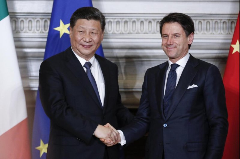 Italian premier Giuseppe Conte (R) shakes hands with Chinese President Xi Jinping during their meeting at the Villa Madama in Rome Saturday where Italy signed a memorandum of understanding to make Italy the first Group of Seven leading democracies to join China's ambitious Belt and Road infrastructure project. Photo by Giuseppe Lami/EPA-EFE