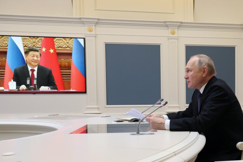 Russian President Vladimir Putin spoke with Chinese leader Xi Jinping on Friday. The leaders vowed to strengthen ties between their nations. Photo by Mikhael Klimentyev/Sputnik/Kremlin Pool/EPA-EFE