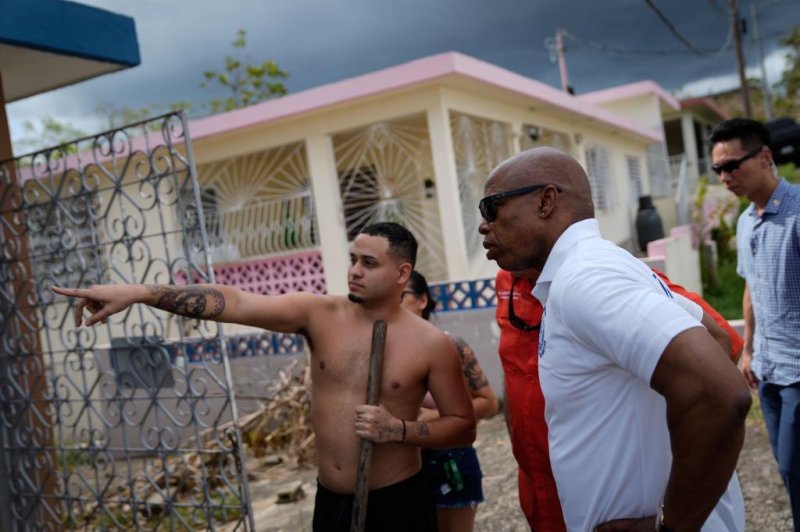 New York City Mayor Eric Adams visits with people in Puerto Rico on Sunday as more than 780,000 customers were without electricity a week after Hurricane Fiona battered the island. Photo courtesy of Eric Adams/Twitter