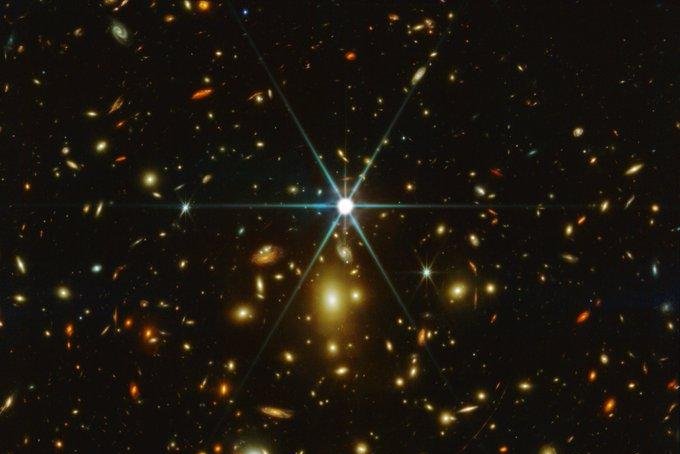 The Earendel star, as glimpsed by the James Webb Space Telescope, is the most distant star ever seen, 12.9 billion light-years from Earth. Photo courtesy of NASA, ESA/Cosmic Spring JWST