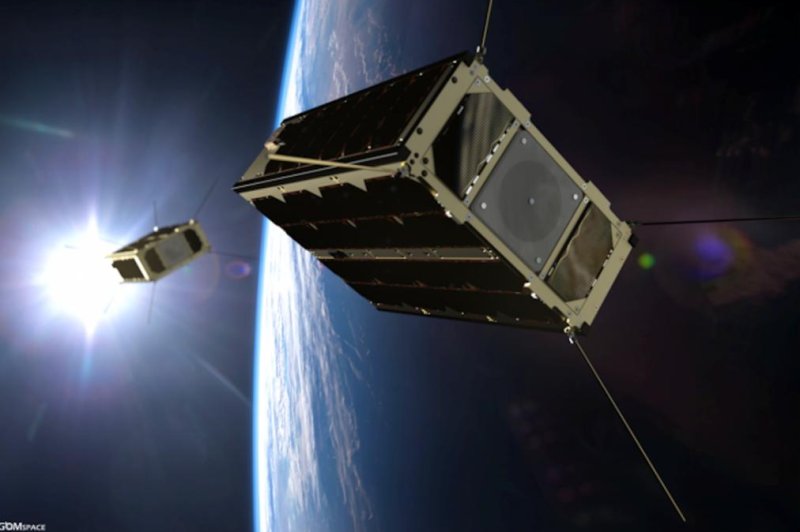 An artistic rendering shows the pair of miniature satellites, GomX-4A and GomX-4B. Photo by GomSpace/ESA