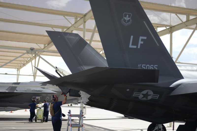 The F-35 program director says industry partners have made necessary adjustments for the controversially expensive effort. Pictured: U.S. Air Force personnel perform maintenance operations on F-35 Lightning II. U.S. Air Force photo by Senior Airman James Hensley