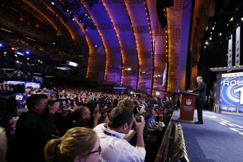 Top NFL Draft prospect Carson Wentz has not heard from the Philadelphia Eagles since the team traded down to the No. 2 pick, presumably to pick Wentz. NFL commissioner Roger Goodell pictured gets set to announce the #1 overall pick at the 2014 NFL Draft at Radio City Music Hall in New York City on May 8, 2014. File photo John Angelillo/UPI