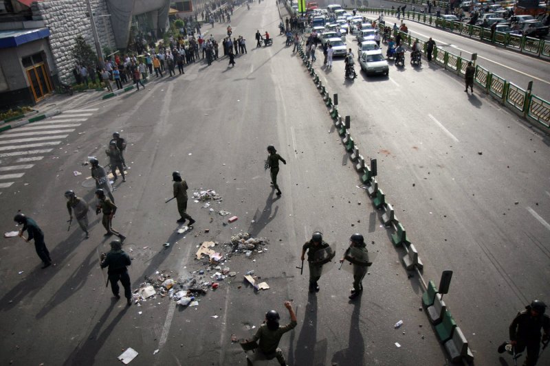 Iran's riot police stand guard as demonstrators gather on the streets to protest the results of the Iranian presidential election in Tehran, Iran on June 20, 2009. (UPI Photo)