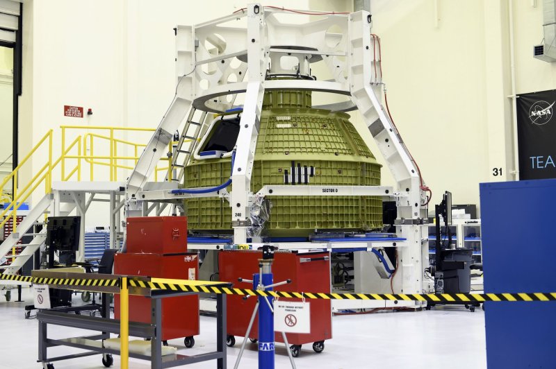 NASA's Orion spacecraft, scheduled for the Artemis III mission that would carry astronauts to the surface of the moon, is prepared for launch Nov. 5 at Kennedy Space Center in Florida. Photo by Joe Marino/UPI