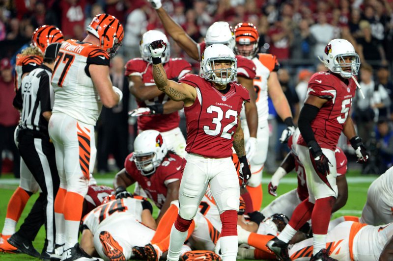Arizona Cardinals defensive back Tyrann Mathieu (C) reacts to stopping the Cincinnati Bengals from getting a first down in the first quarter of the game at University of Phoenix Stadium in Glendale, Arizona, November 22, 2015. Photo by Art Foxall/UPI
