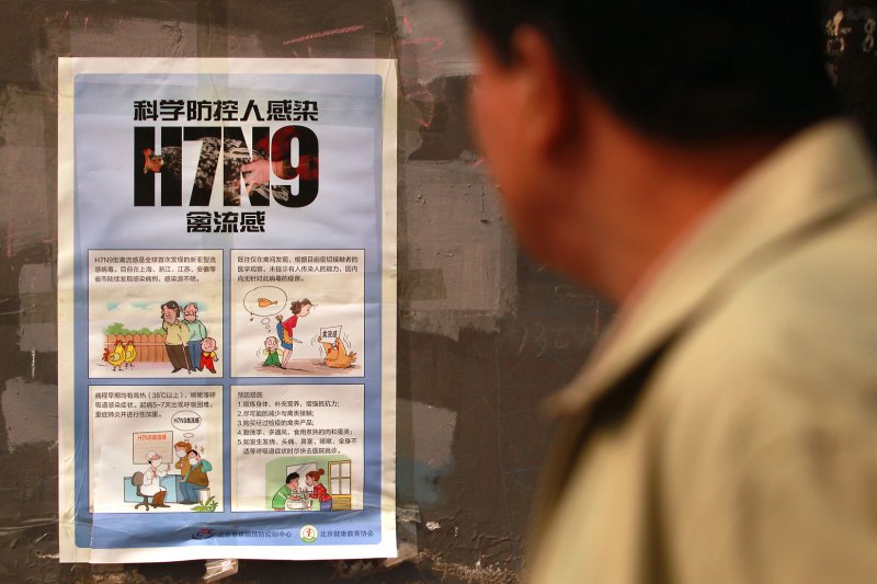 Public health notices are posted throughout the city Beijing as the new H7N9 strain of bird flu has infected 139 humans so far, including 45 deaths. The report of an infection in Hong Kong could mean that the virus is spreading. (File/UPI/Stephen Shaver)
