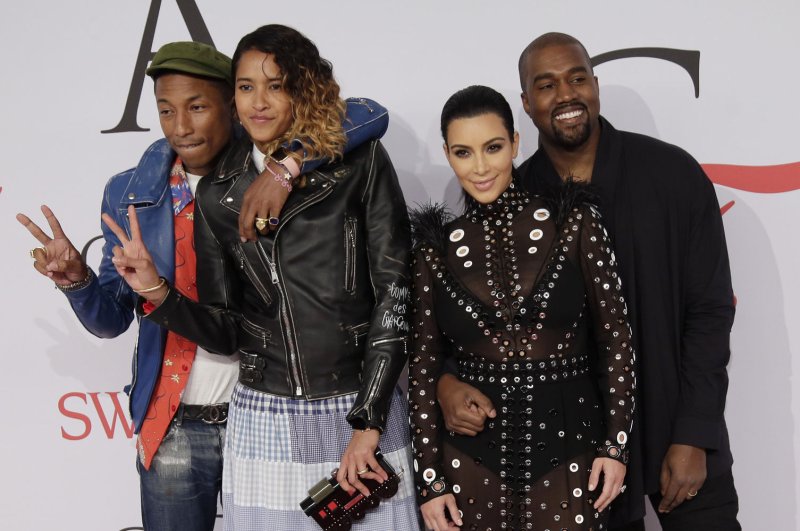 Kim Kardashian's dress caught fire at the CDFA Awards and Pharrell put it out
