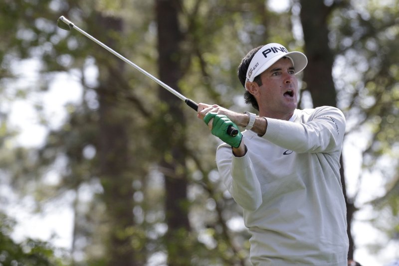 Bubba Watson hits his tee shot on the 4th hole in the 1st round of the 2018 Masters Tournament Thursday at the Augusta National Golf Club in Augusta, Ga. Photo by John Angelillo/UPI | <a href="/News_Photos/lp/352045c332c60b8b07948f20b84f243e/" target="_blank">License Photo</a>