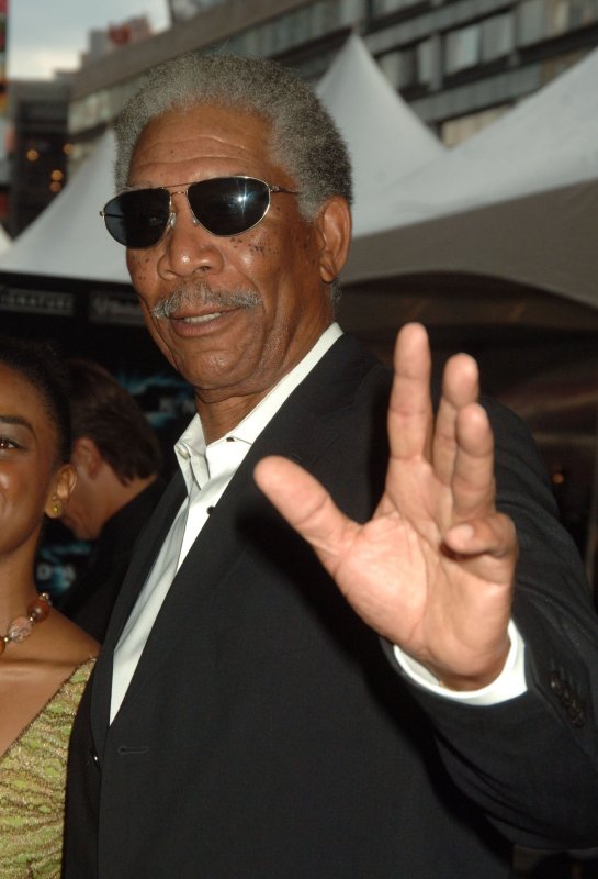 Actor Morgan Freeman attends the world premiere in New York for his new film "The Dark Knight" on July 14, 2008. (UPI Photo/Ezio Petersen) | <a href="/News_Photos/lp/d7b1b0c8ff66d71ec823be2506070d23/" target="_blank">License Photo</a>