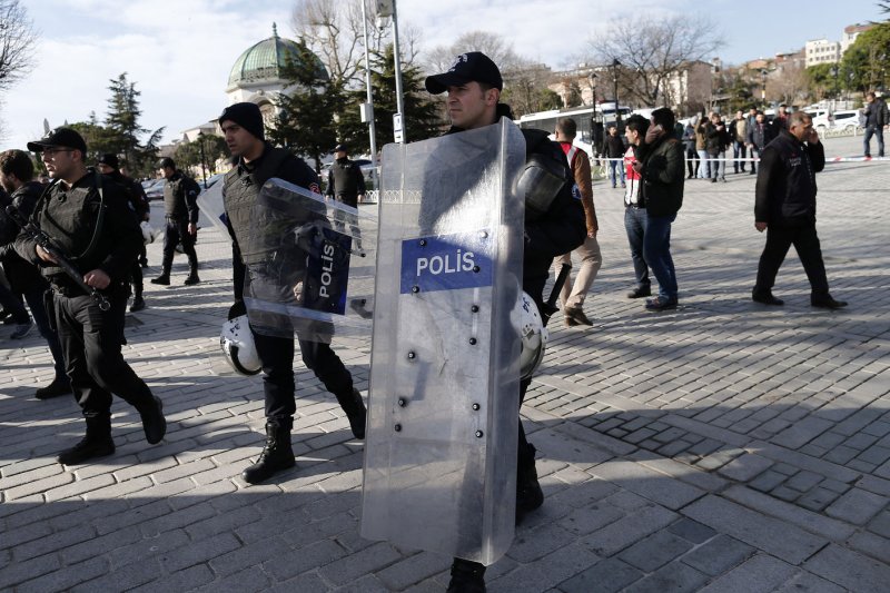 Turkish police stand guard as forensic experts inspect the site of a blast in the Blue Mosque area in Istanbul's tourist hub of Sultanahmet, Turkey on January 12. A Turkish police shuttle bus was bombed Tuesday in the city of Diyarbakir. File photo by Ali Turkel/UPI | License Photo | <a href="/News_Photos/lp/3f7fb1f0b42e73e55deb290b5e708cf1/" target="_blank">License Photo</a>