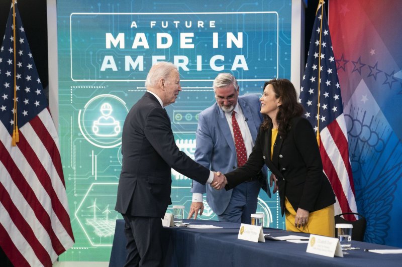 President Joe Biden shakes hands with Michigan Gov. Gretchen Whitmer during a meeting in Washington, D.C., on March 9, 2022. File Photo by Sarah Silbiger/UPI