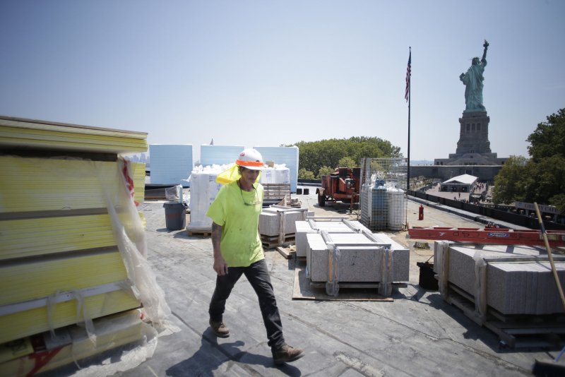 Friday's report also indicated that more workers are physically returning to the office. The Labor Department said 6.5% of workers worked remotely in August, down from 7.1% in July. File Photo by John Angelillo/UPI | <a href="/News_Photos/lp/822c639d79370cf23f878349b8743caa/" target="_blank">License Photo</a>