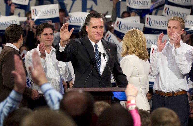 Mitt Romney is joined on stage by his family during a Jan. 10, 2012, election rally in Manchester, N.H. UPI/Kevin Dietsch
