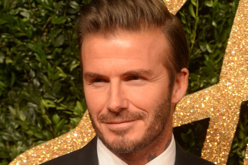 David Beckham: 'I'm secure as a person, a husband, a dad'