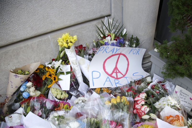 A Belgian man of Moroccan descent was arrested in Turkey on suspicion he scouted targets for the attacks on Paris that left at least 129 dead last week. A memorial of flowers, notes and candles grows outside of the French Consulate after the Nov. 13 attacks. Photo by John Angelillo/UPI